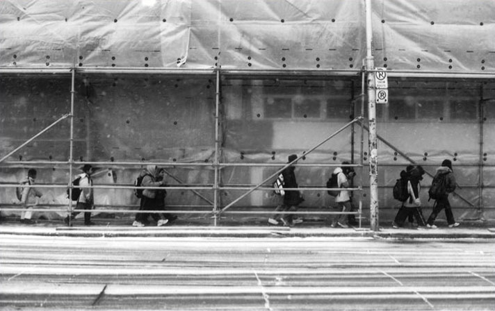 Kids walking along McCaul Street, Toronto, Ontario, Canada